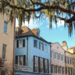 Colorful historic row houses in Charleston illustrating current mortgage rates and housing affordability.