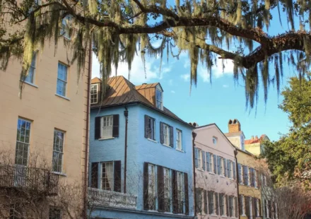 Colorful historic row houses in Charleston illustrating current mortgage rates and housing affordability.