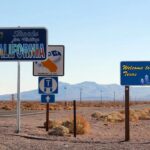 California and Texas highway signs illustrating a move between the states and potential RSU tax implications