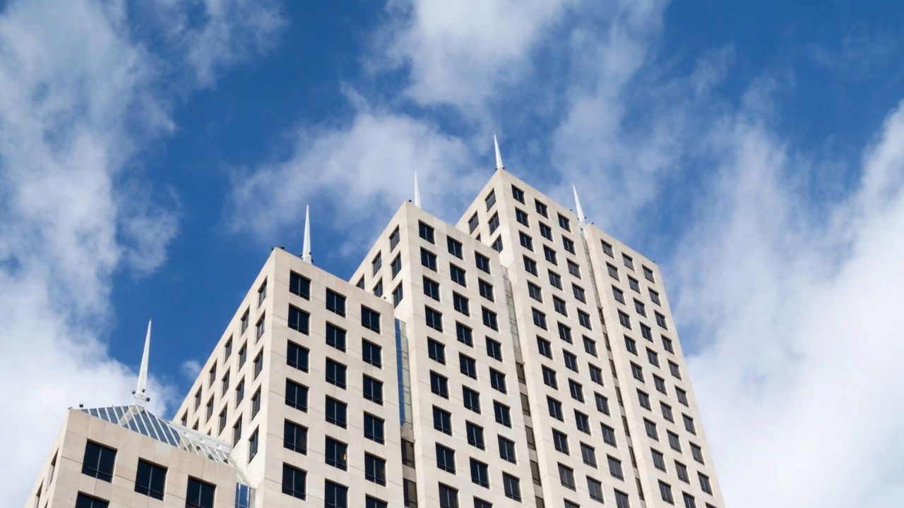 Bank office building under a blue sky illustrating Florida banking changes in 2026