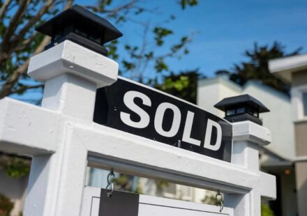 Sold home sign representing New York mortgage rates and homebuying costs